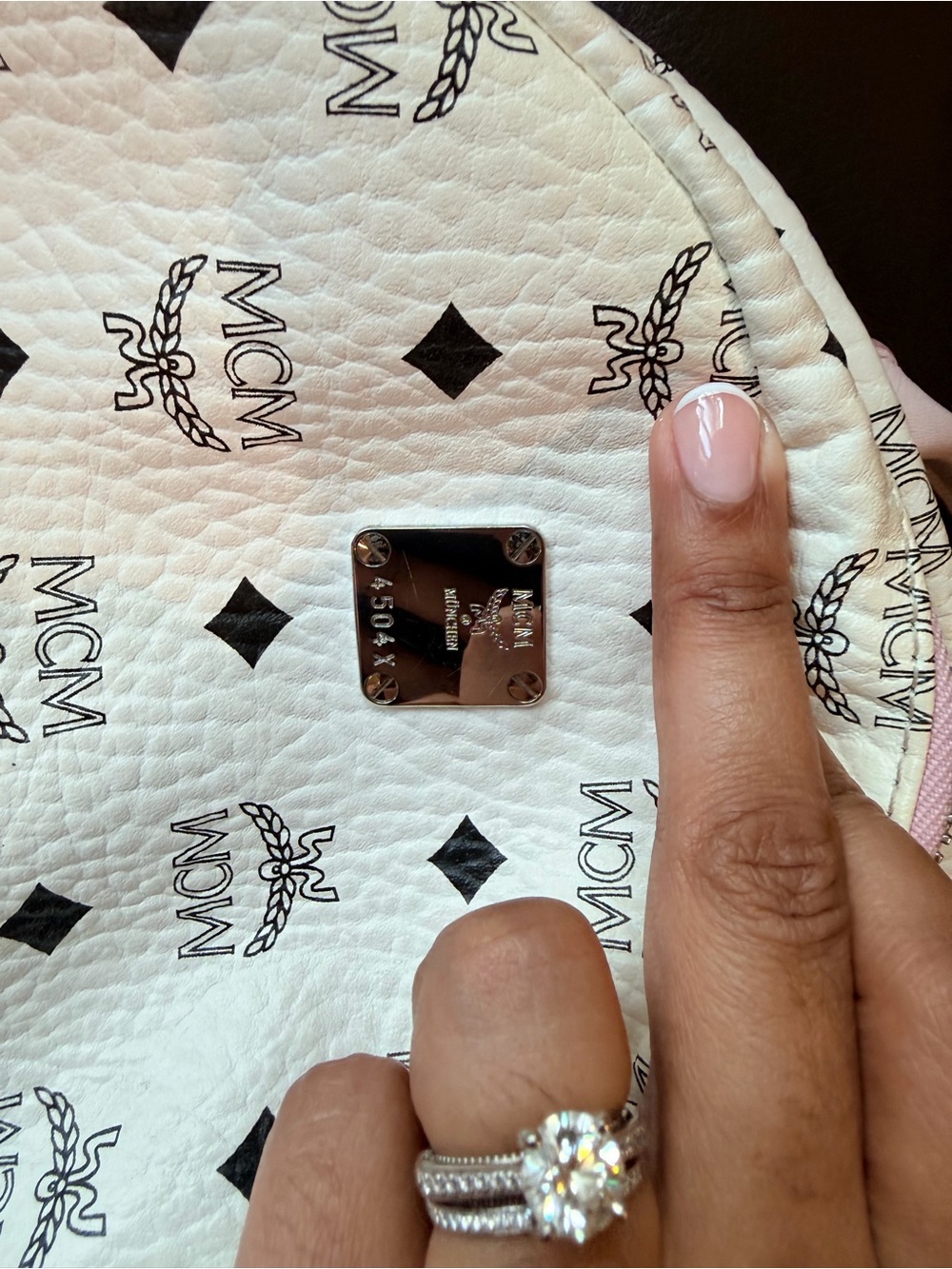 MCM White Backpack with Pink Front Pocket and Strap Accents - Picture 4 of 7